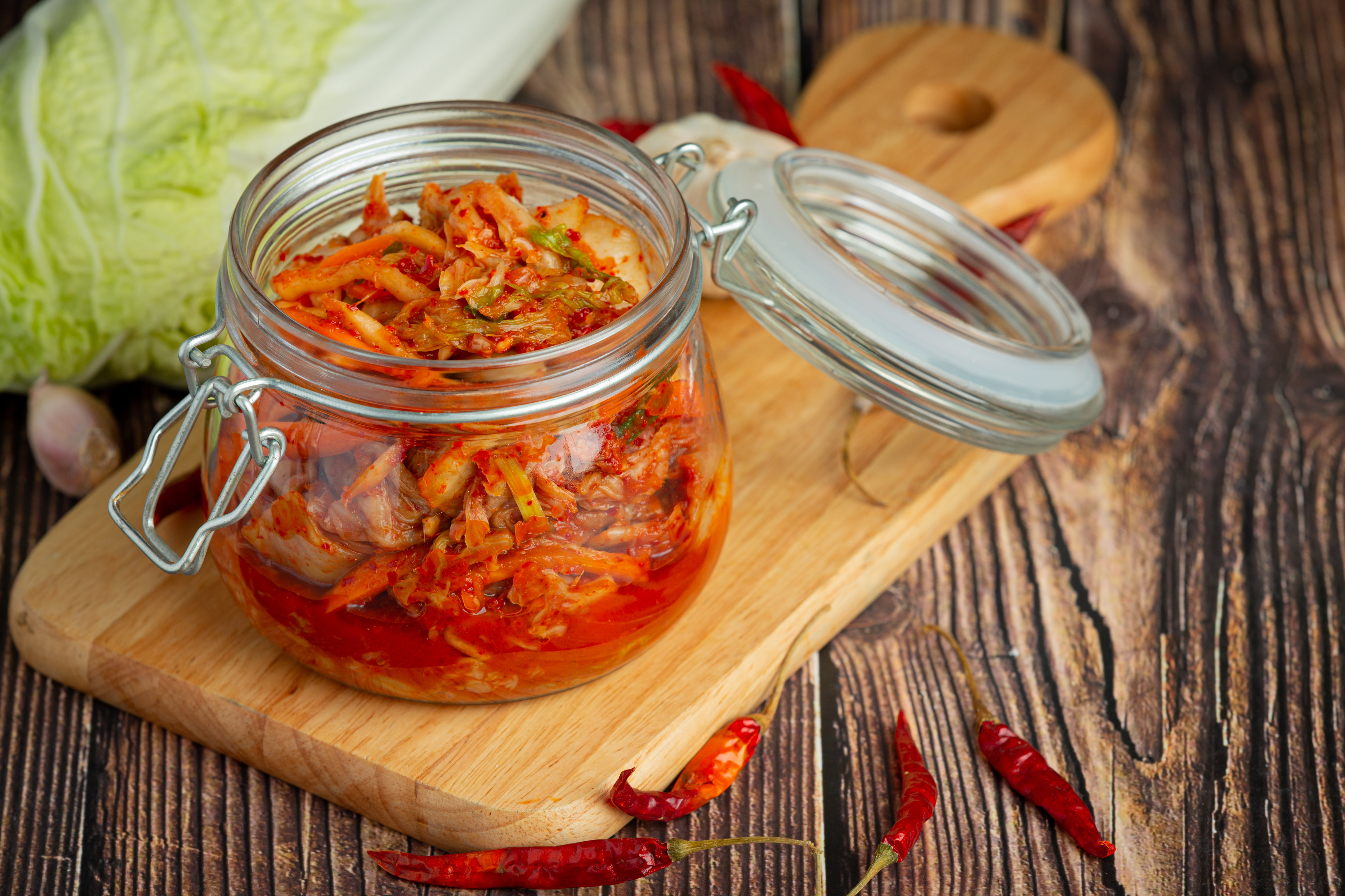 Nutritional Benefits of Kimchi Fermentation,kimchi in a jar showing fermentated kimchi